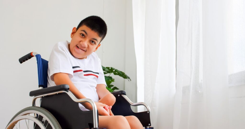 Disabled boy in a wheelchair.